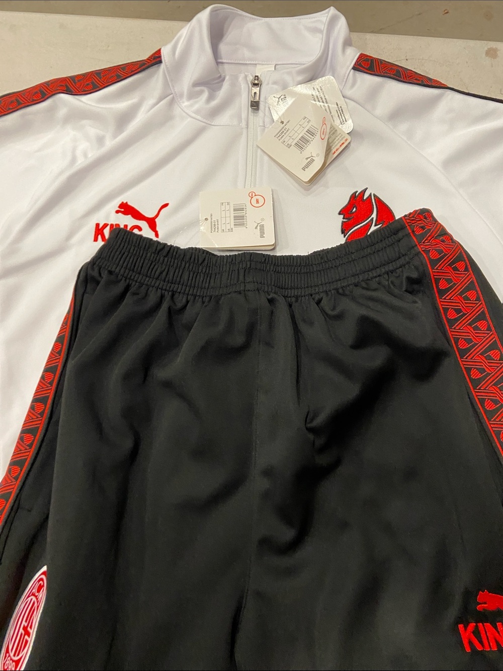 Puma Kids Black Joggers with Red Trim